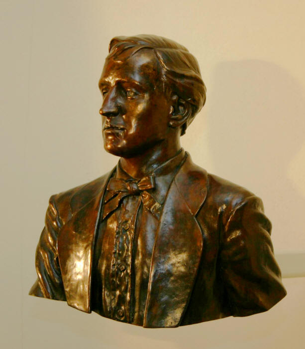 Bronze statue of young R. A. Long  donated to the High School by the R. A. Long Foundation