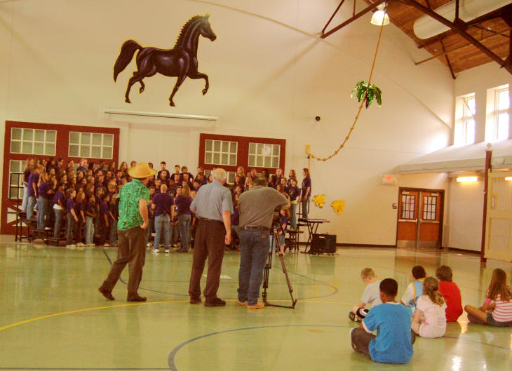 The Stallion Singers perform a song about the Long Legacy.